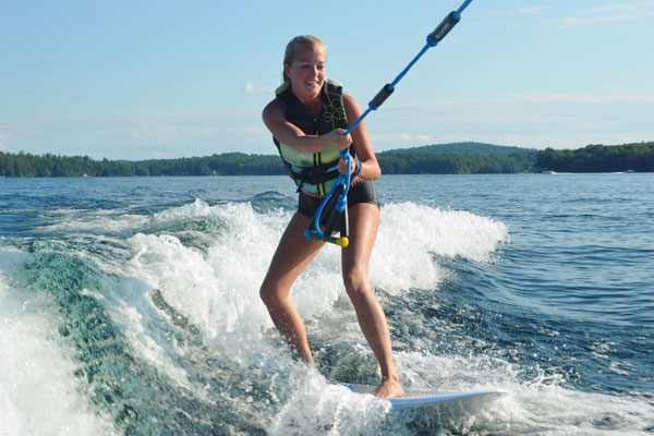 Christina Lake Motel and RV Park - Things To Do In Christina Lake - Girl Surfing Behind A Boat